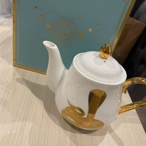 Elegant White and Gold Teapot with Cobra Design